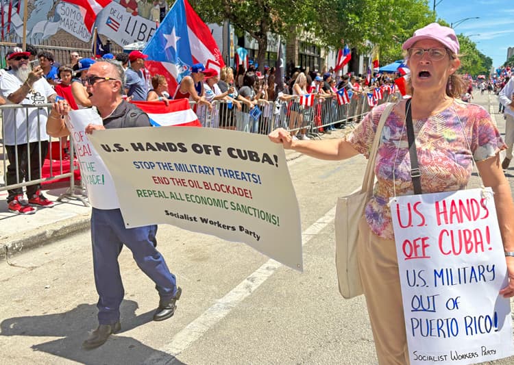 Kubasolidaritetskontingent i Puerto Rican People’s Parade i Chicago den 13 juni. USA:s härskare trappar upp angreppen på Kubas suveränitet och socialistiska revolution, samtidigt som de riktar in sig på dem som stöder revolutionen.